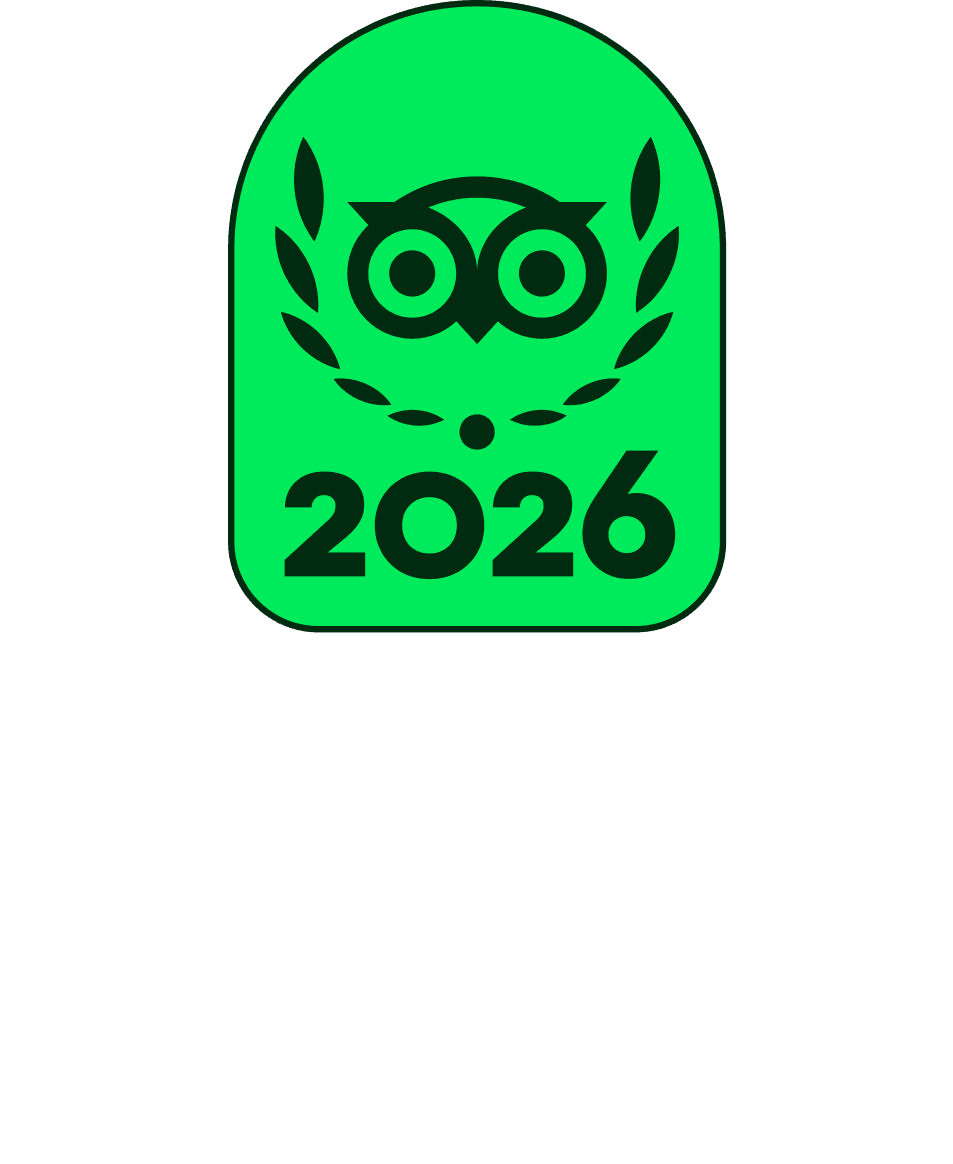 Tripadvisor Travelers’ Choice 2026 award badge with green owl icon and white lettering on black
